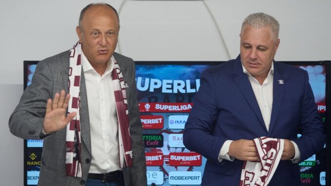 Bucharest, Romania. 21st Aug, 2024: Dan Sucu (L), the financier of FC Rapid, leaves after the presentation of Marius Sumudica (R), the new coach of the Fotbal Club Rapid Bucharest, during a press conference, at Superbet Arena-Giulesti, in Bucharest. Credi